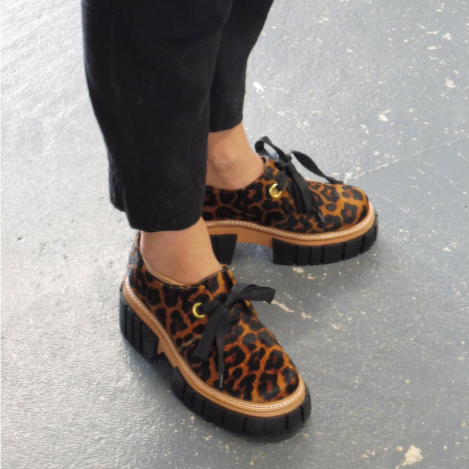 Collection of flat shoes from sneakers to loafers